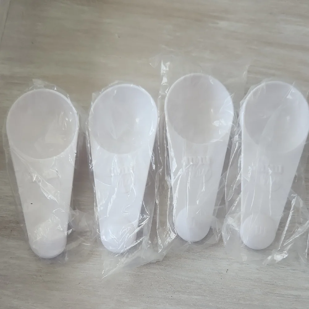 White Plastic Measuring Scoops for Parties